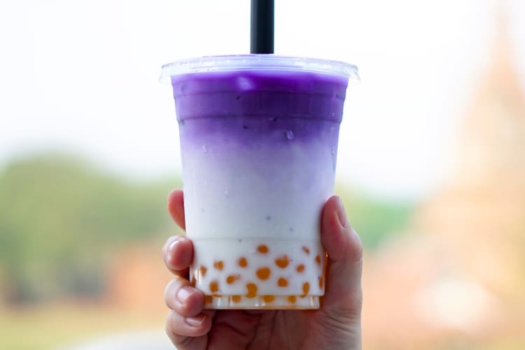 A taro milk iced tea with boba