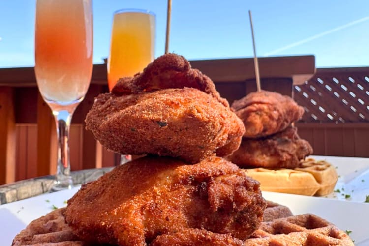 Two chicken waffle meals with two fruit juices from 7 Mile House, a Filipino restaurant in San Francisco