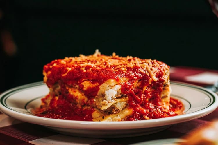 Eye-level view of lasagna from Angela's Italian Restaurant