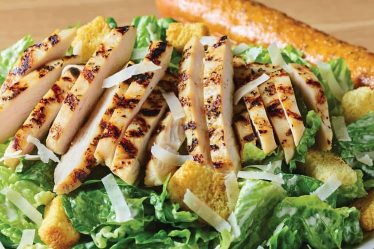 Chicken Caesar salad is a healthy Applebee's secret menui item