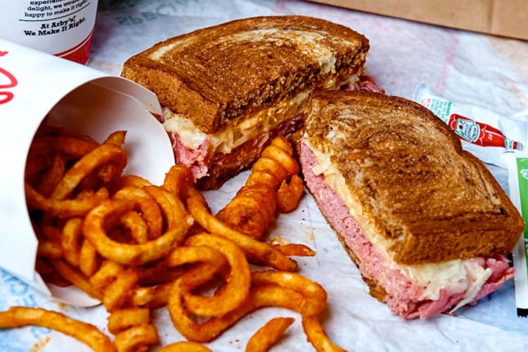 A Reuben sandwich and curly fries from Arby's