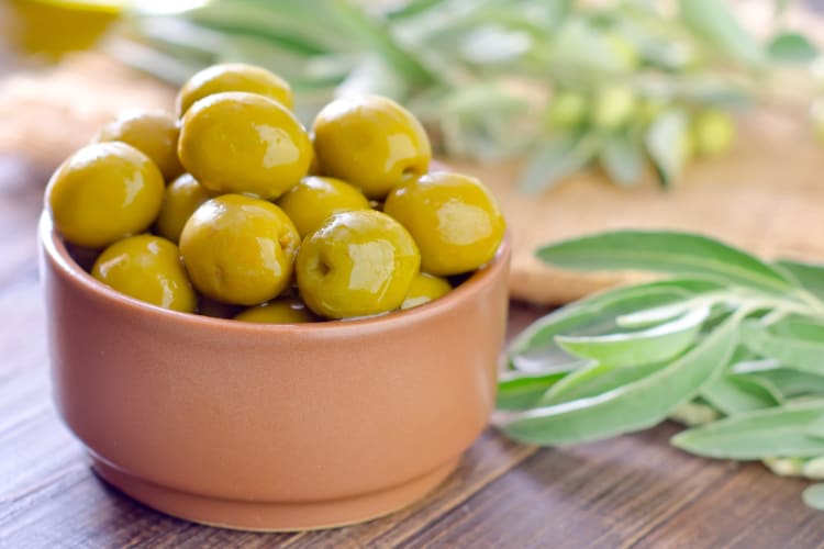 Green olives in a bowl