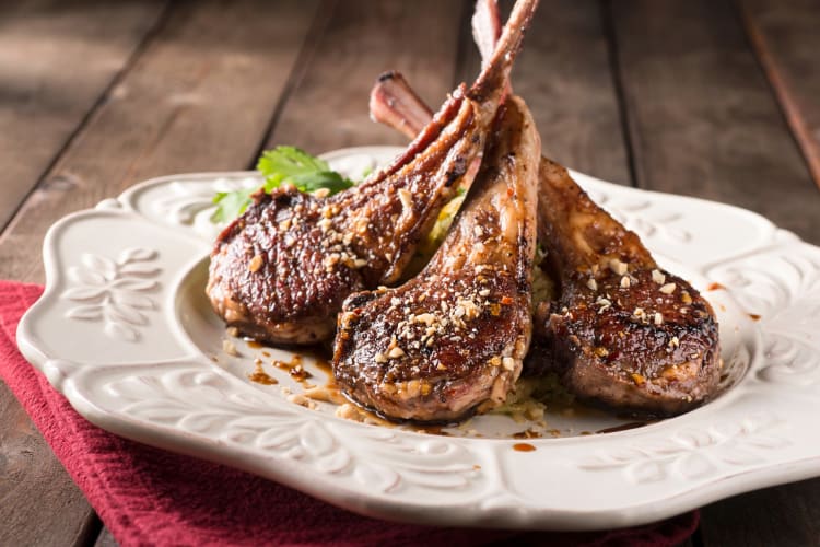 Lamb chops on a white plate