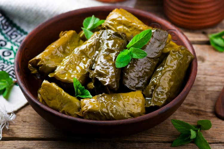 A bowl of dolmades