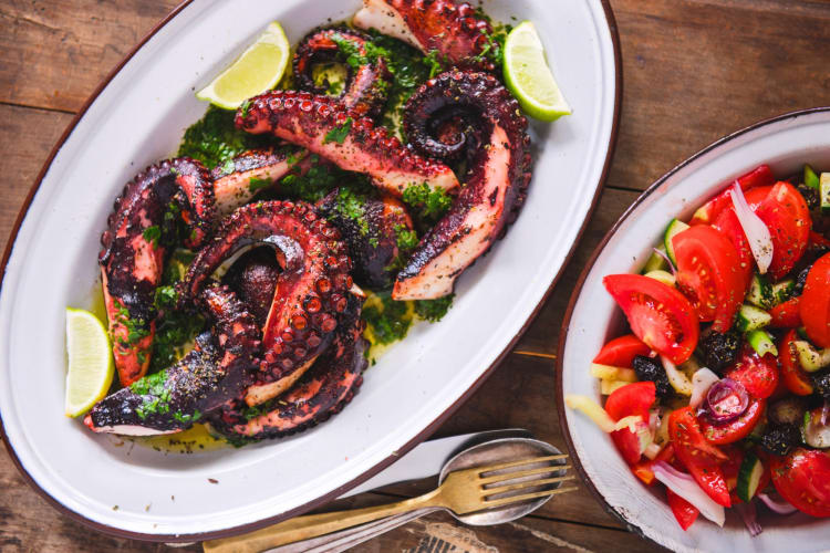 A bowl of octopus and Greek salad