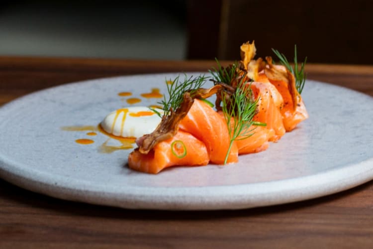 A salmon dish on a plate