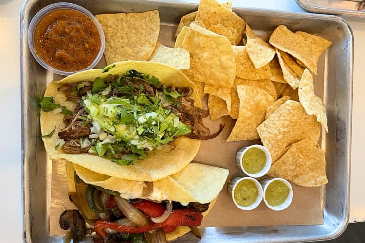 A filling ostin taco brisket taco can be found at this fast food restaurant in Austin. 