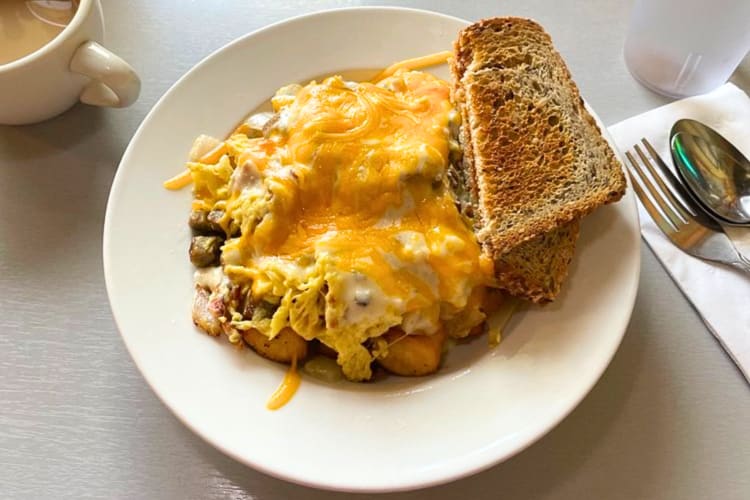 Breakfast poutine with toast on the side. 
