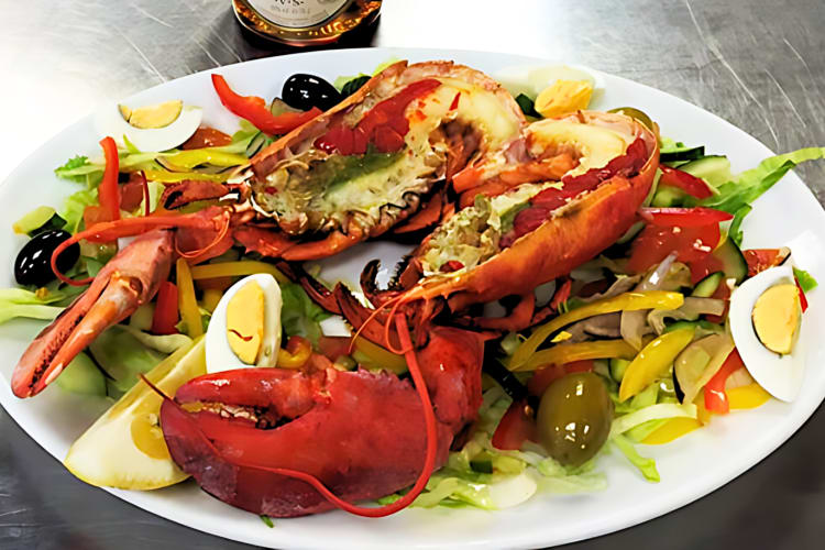 Try red lobster with salad at this fish and chip shop in London. 