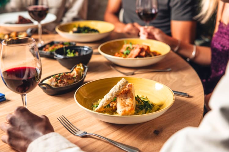 Try roasted salmon paired with wine at this romantic restaurant in London. 