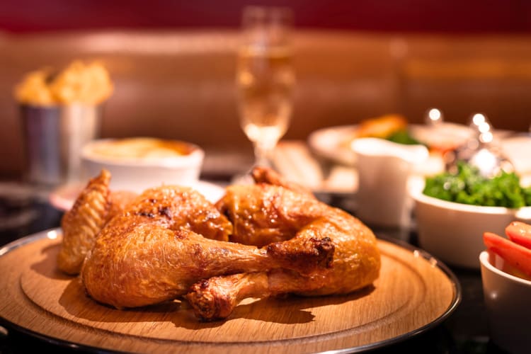 Taste delicious rotisserie chicken at this romantic restaurant in London.