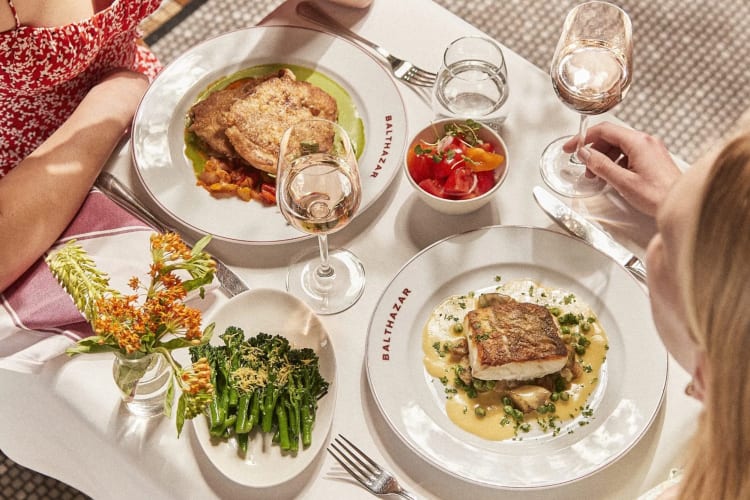 Steak, roasted broccoli, salad, roasted salmon and more are on offer at this romantic restaurant in London. 