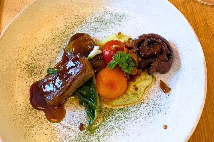 Fried pork belly with egg can be found in this romantic restaurant in London. 