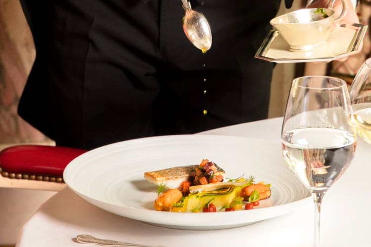 One of the fanciest romantic restaurants in London, order Cornish sea bass at The Ritz.