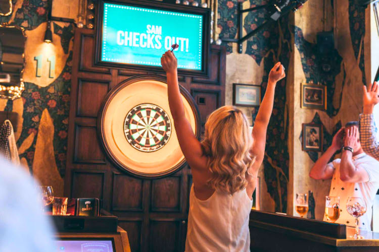Have a go at futuristic darts at this team building activity in London. 