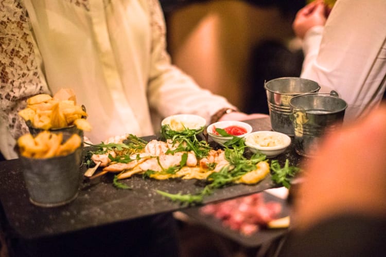 At this upscale team building activity in London, try chicken skewers and other French bistro dishes.  