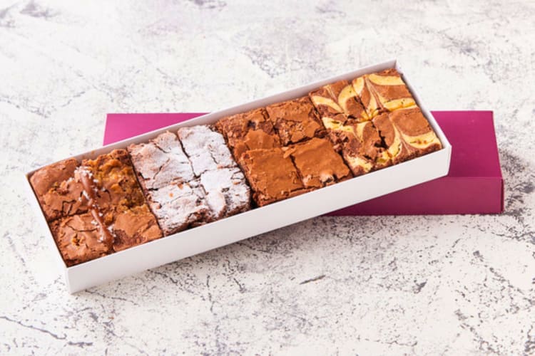Salted Caramel, Boston Cranberry, Chocolate Chip and Curly Whirly brownies are on offer at this London dessert spot. 