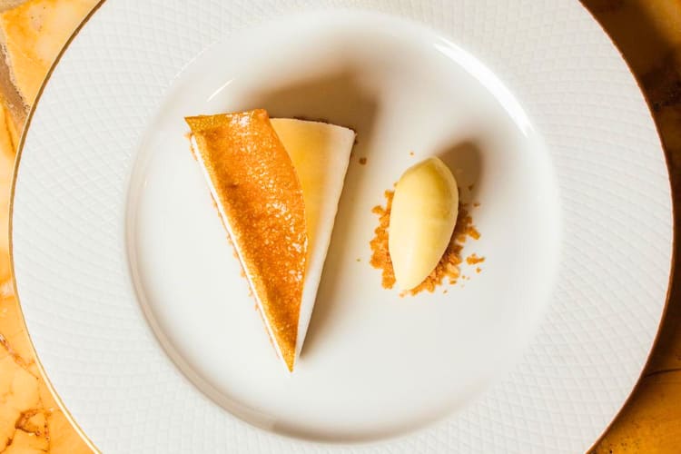 At this fancy dessert spot in London, try this lemon cheesecake. 