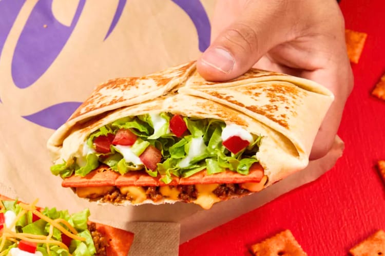 A Big Cheez-It Crunchwrap featuring seasoned beef, nacho cheese sauce, lettuce and tomatoes is a Taco Bell new item to try. 