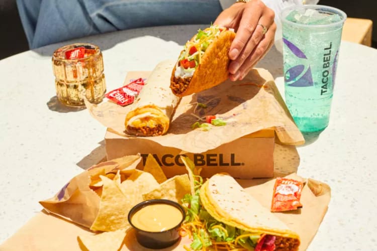 The Luxe Cravings Box is a Taco Bell new item featuring the Chalupa Supreme, Double Stacked Taco, chips with nacho cheese sauce, Beefy 5-Layer Burrito and a Medium Fountain Drink.