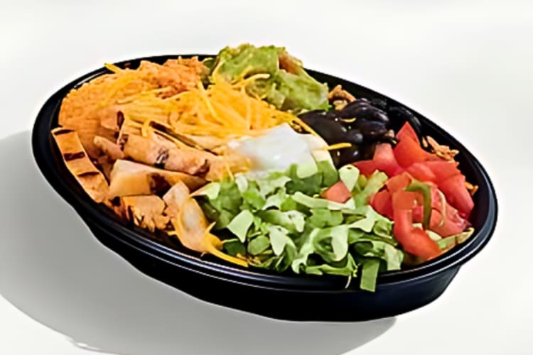 Cantina Chicken Bowl is a Taco Bell new item that features seasoned rice, chicken, black beans, shredded purple cabbage, lettuce, fresh pico de gallo, daily-made guacamole and cheddar cheese.