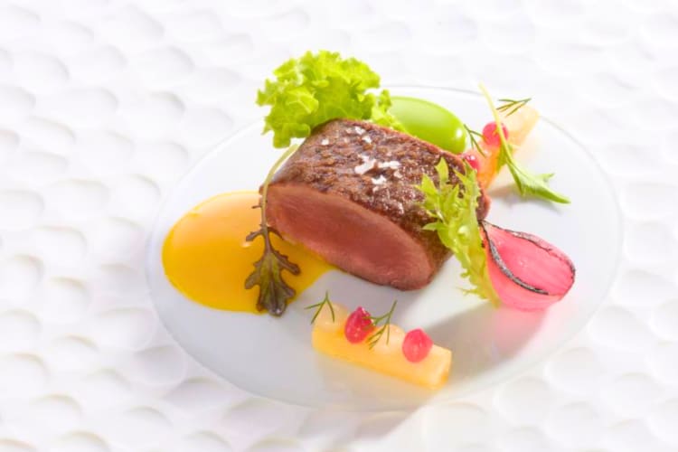 Try this premium cut of beef with a small salad at this Michelin star restaurant in Barcelona.