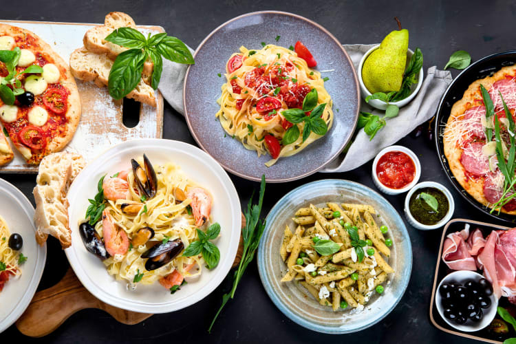 Variety of Italian meals including pizza and pasta are perfect for an Italian dinner party theme. 