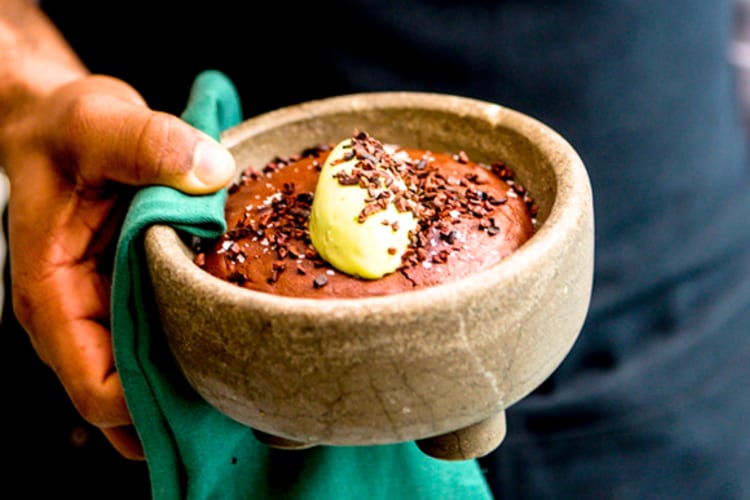 Order thick chocolate mousse at this Madrid restaurant. 