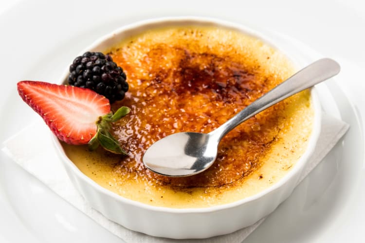 This Barcelona food looks very similar to crème brûlée and is served with fruit. 