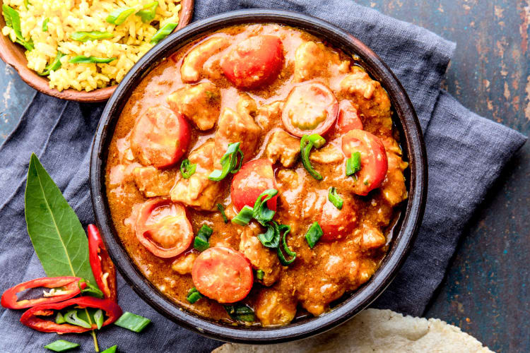 This North Indian food is a classic dish made of chicken and vegetables topped in a creamy sauce. 