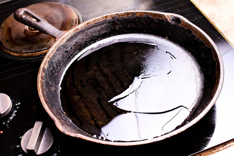 An oiled cast iron skillet.