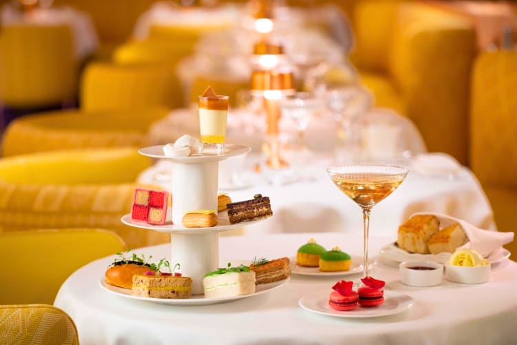 A delightful afternoon tea including small cakes, sandwiches and wine is available at this Michelin star restaurant in London. 