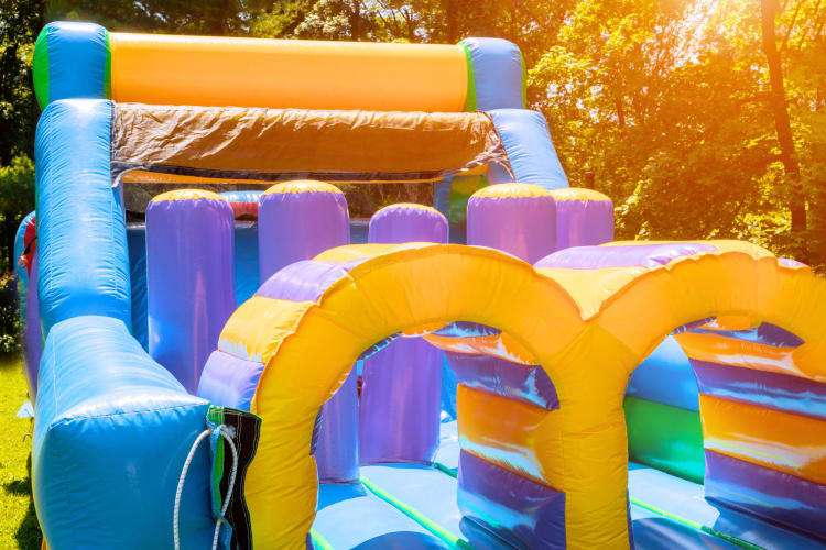 a bounce house is a great graduation party idea 