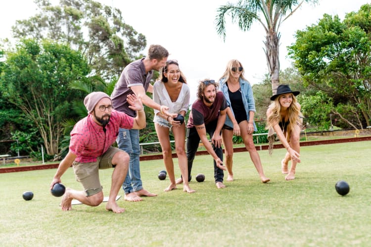 Playing lawn games is a traditional backyard party idea
