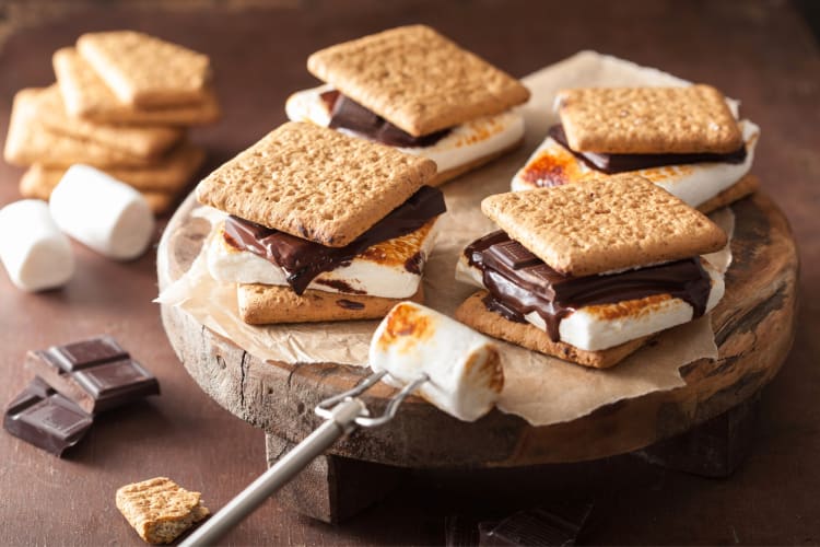 Making s'mores is a classic backyard party idea