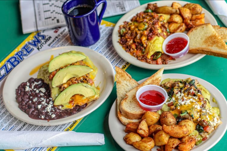 Breakfast dishes on a green table