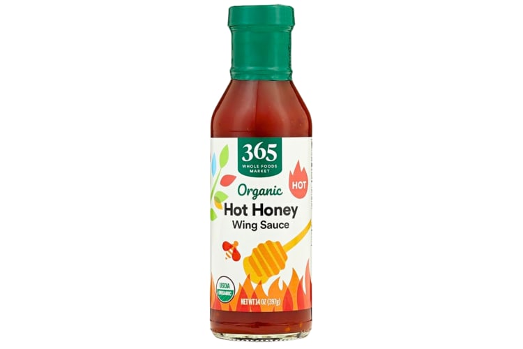 A bottle of 365 by Whole Foods Market Organic Hot Honey Wing Sauce