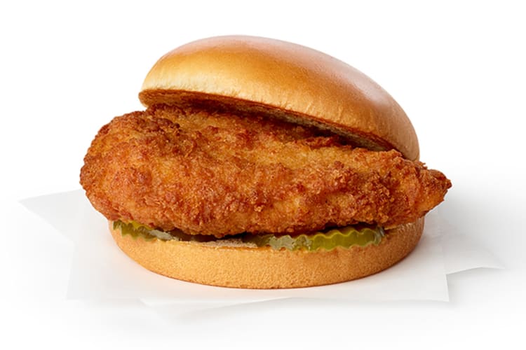 A chicken sandwich with pickles from Chick-fil-A