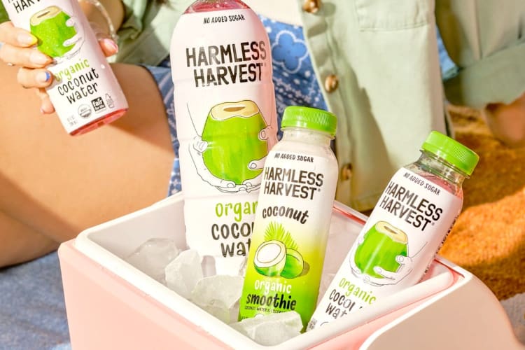 Bottles of coconut water in a cooler