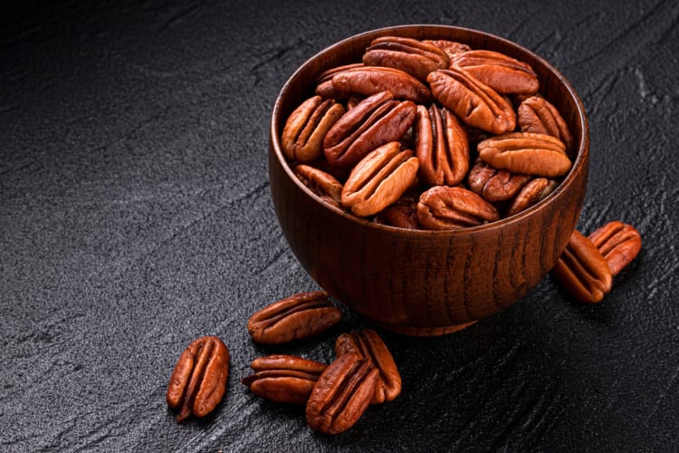 A bowl of pecan halves