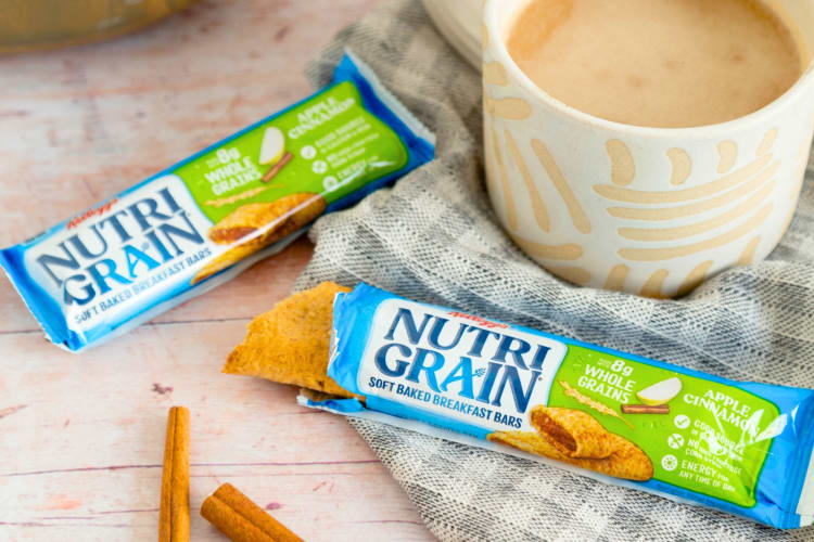 Two Nutri-Grain breakfast bars next to a cup of tea