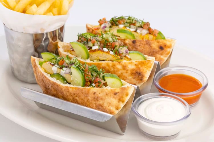 Pitas filled with chicken and salad