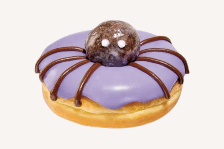 A purple donut designed like a spider