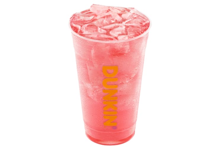 A pink beverage in a clear Dunkin' Donuts cup