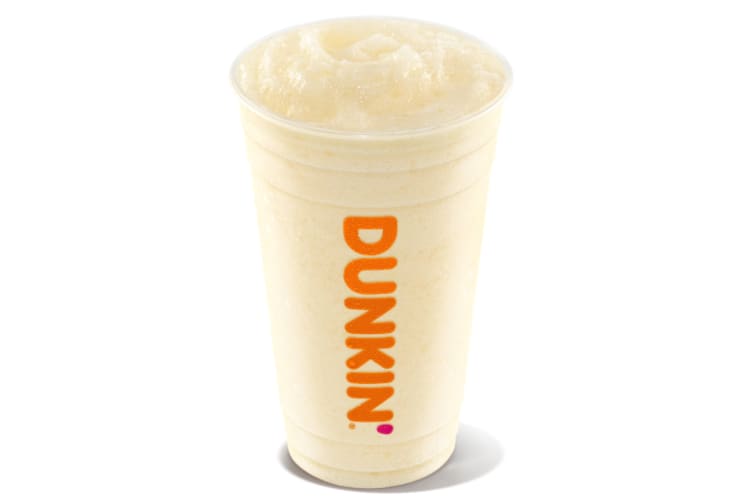 A vanilla blended drink in a clear Dunkin' cup