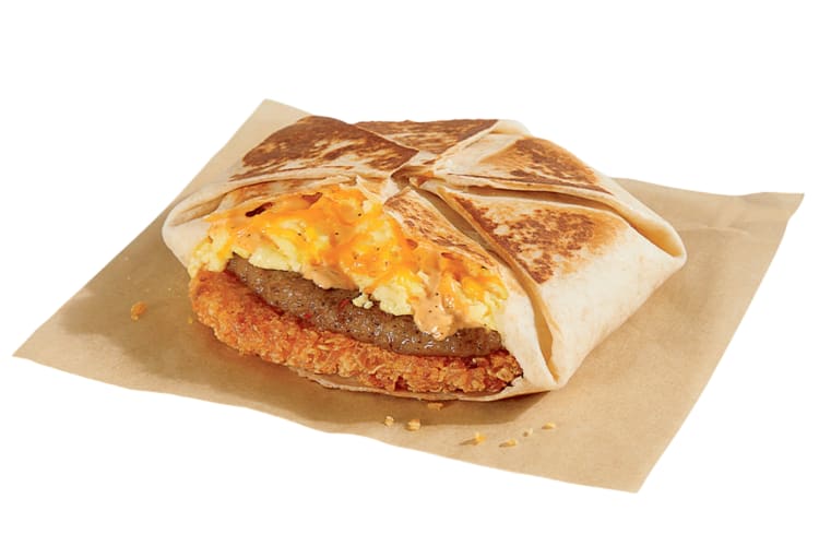 A Breakfast Crunchwrap with eggs, hash brown and sausage from Taco Bell