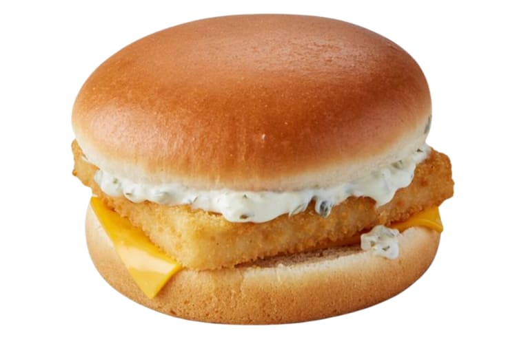 A fish sandwich with tartare sauce and American cheese