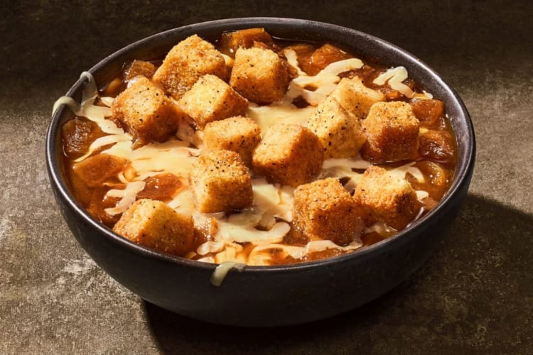 French onion soup with croutons on top