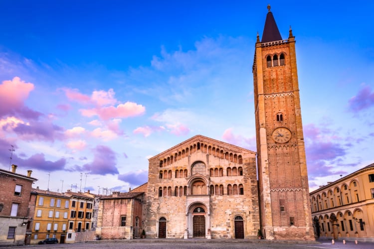 Parma Cathedral under a blue and purple sky