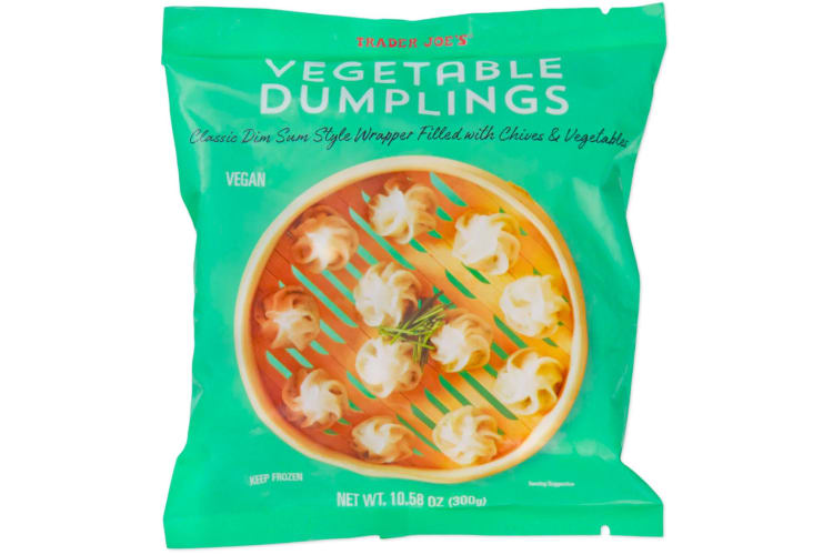 A green packet of Trader Joe's vegan dumplings